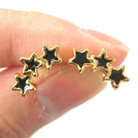 Small Connected Star Shaped Stud Earrings in Black on Gold